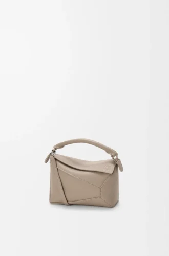 Mini Puzzle Edge Tasche aus weichem genarbtem Kalbsleder Clay
