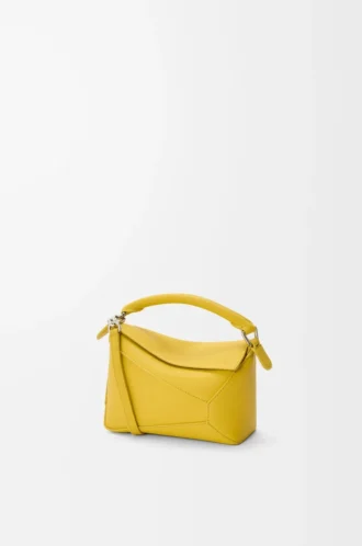 Mini Puzzle Edge Tasche aus weichem genarbtem Kalbsleder in Dandelion