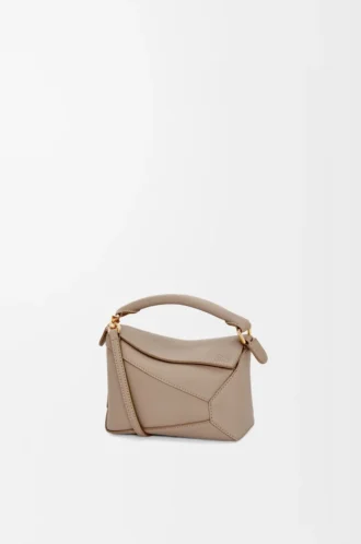Mini Puzzle Edge Tasche aus weichem genarbtem Kalbsleder Sand