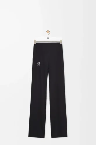 Weiche Bootleg-Hose aus technischem Jersey in Schwarz Weiche Bootleg-Hose aus technischem Jersey in Schwarz